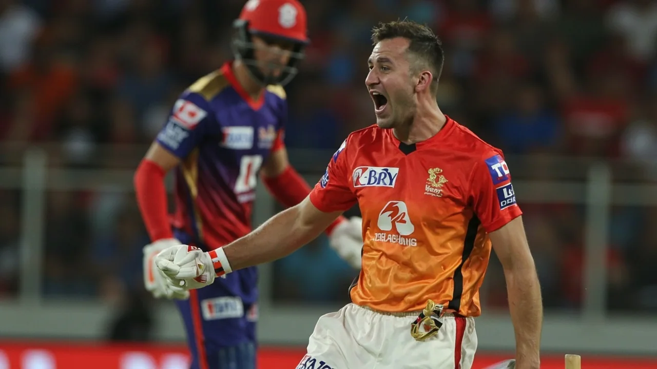 Tight sideline action frame of a batsman in stance during a T20 fixture